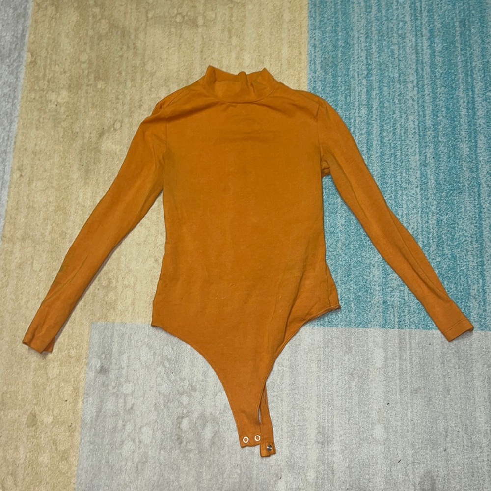 American Apparel burnt orange long sleeve high neck bodysuit with open back